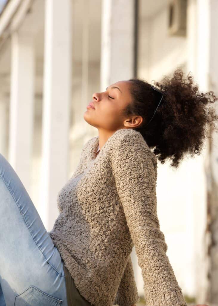 woman sitting in the sun