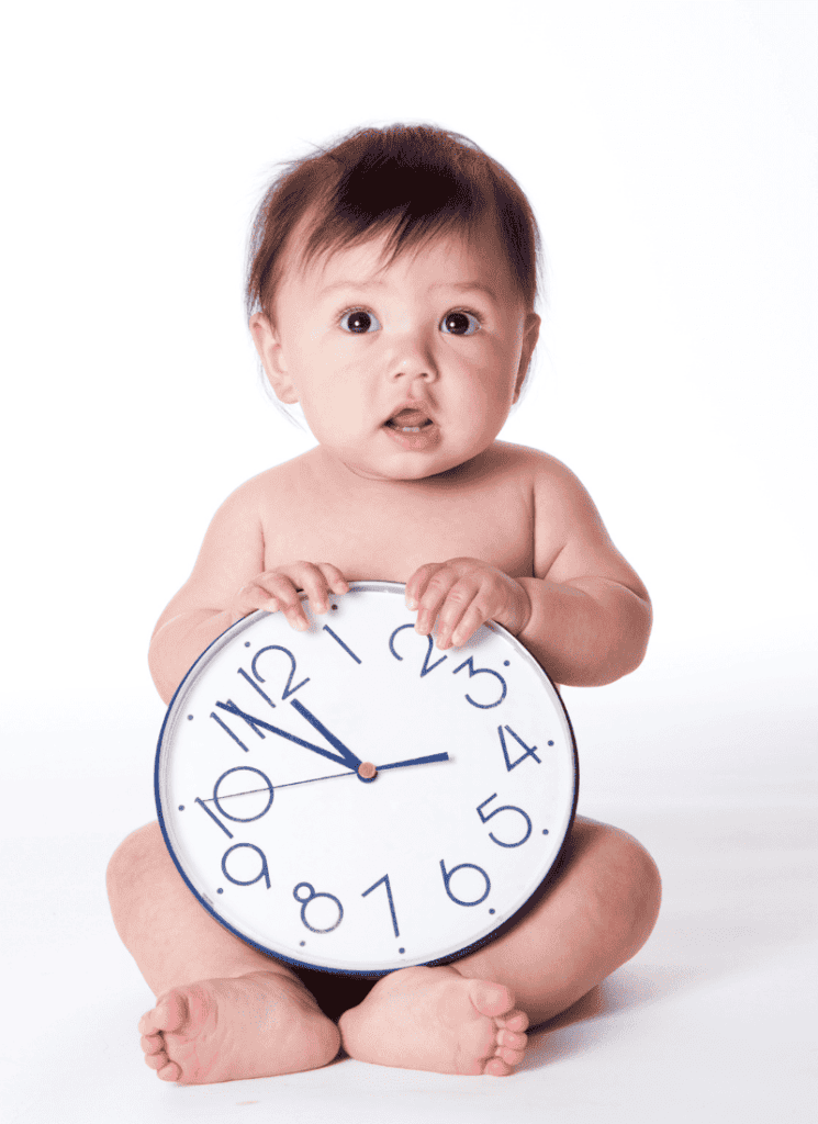 Baby with clock
