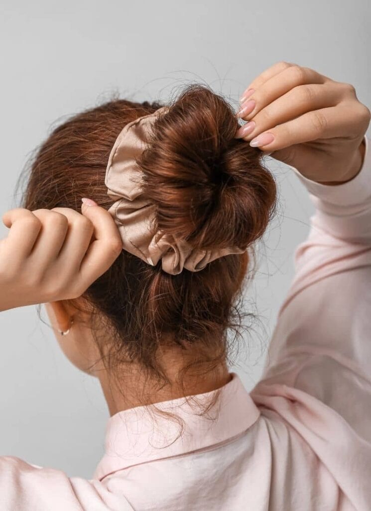 How can I reduce my postpartum hair loss