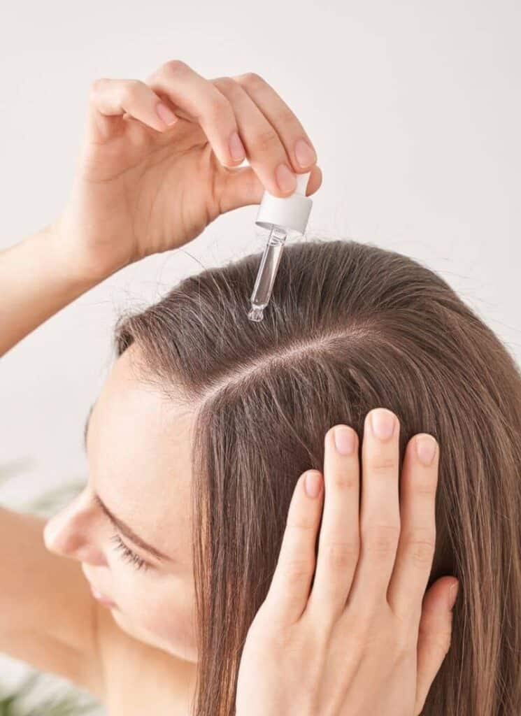 how can I reduce my postpartum hair loss?